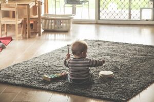 baby playing in home